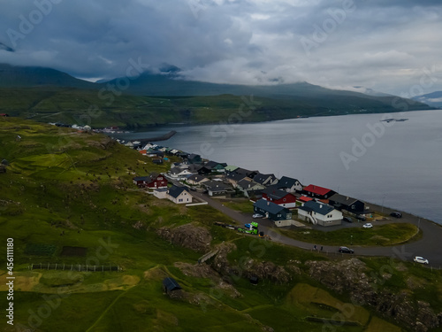 Beautiful aerial view of the Village of Eidi in Eysturoy next to Risin and Kellingin, the witch and the giant in the Faroe Islands