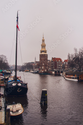 Montelbaanstoren, Oudeschans canal. The famous old defensive tower has been an inspiration for painters since the 16th century when it was built. View from the painters corner, Buurtpark ‘s Gravenhek photo
