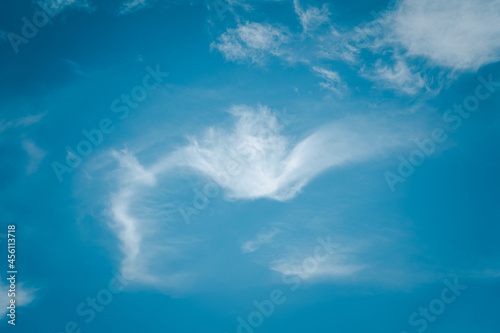 empty blue sky background with clouds © Richman Photo