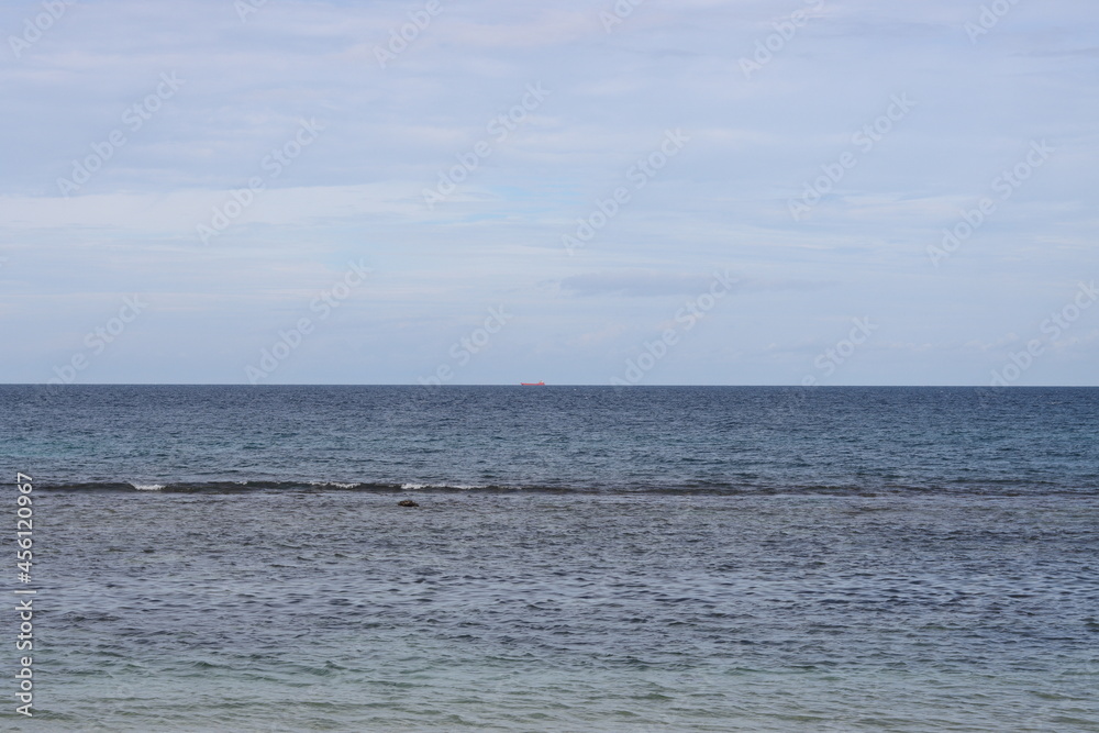 photo of the coastline of the beach during the day photo of the coastline of the beach during the day