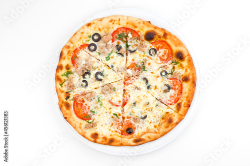 pizza on a white plate on a plate
