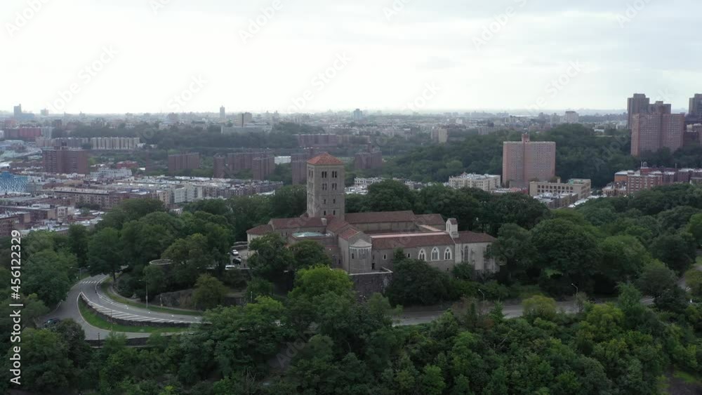 Rising Counterclockwise aerial orbit of The Cloisters museum in Upper Manhattan NYC. The Inwood neighborhood responds in the background with a parallax view Rising Counterclockwise aerial orbit of The Cloisters museum in Upper Manhattan NYC. The Inwood neighborhood responds in the background with a parallax view
