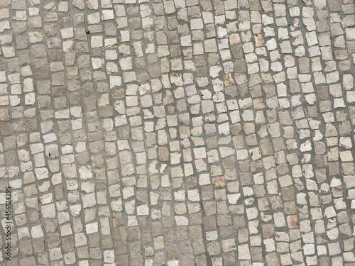 Closeup of plain mosaic floor tiles.