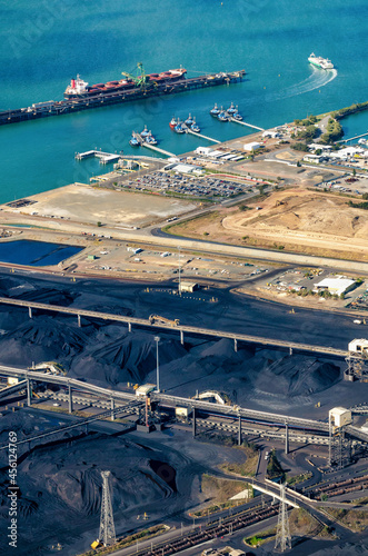 Vertical shot of pilot boats and RG Tanna coal wharfs and piles photo