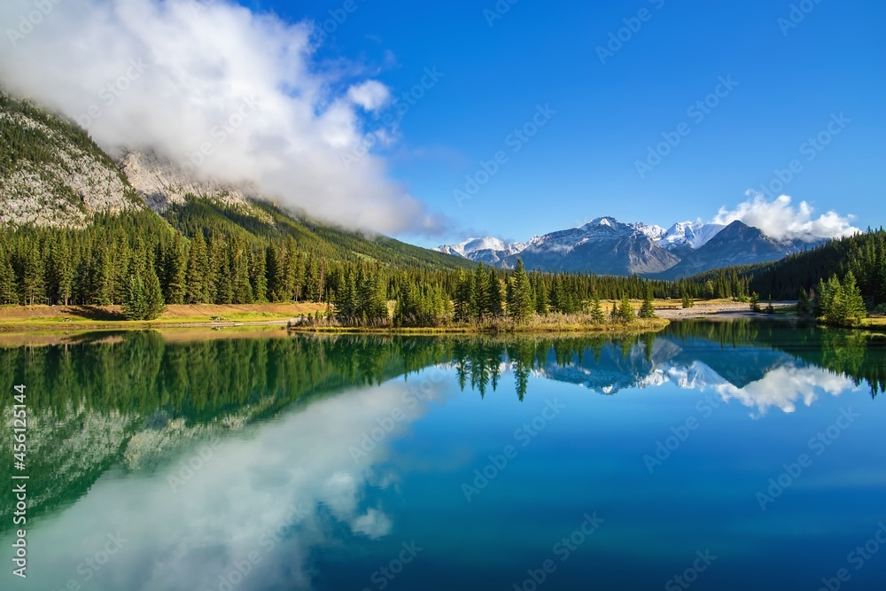 Blue Sky And Clouds Reflecting On Cascade Ponds
