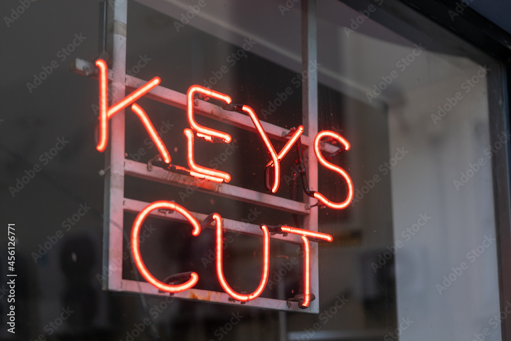 Red neon sign saying 'Keys Cut
