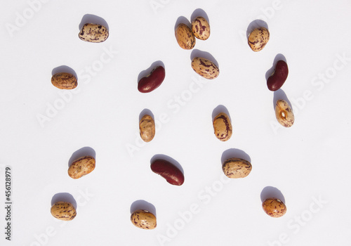 patterned kidney beans isolated white background. (Delicious mottled, raw common beans)