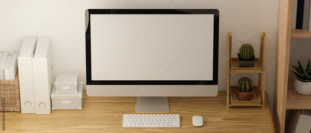 Obraz premium Minimal home office in stylish cozy Scandinavian interior with computer mock-up, 3d rendering