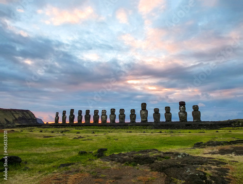 Moai statues on Easter Island. Ahu Tongariki against Blue Sky, Chile, South America photo