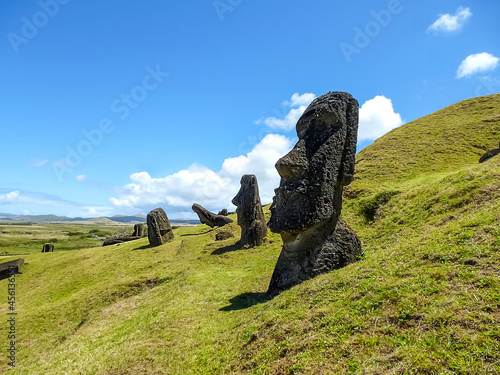 Moai statues on Easter Island. Ahu Tongariki against Blue Sky, Chile, South America photo