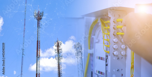 Foto Fiber Optic Distribution Unit (FDU) on wall mount with Cell phone tower
