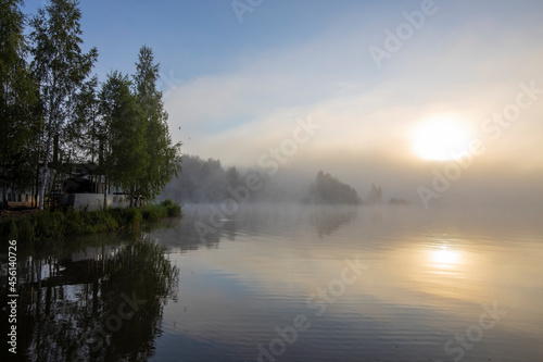 Dawn by the river in the summer season. Beautiful landscape of morning freshness.