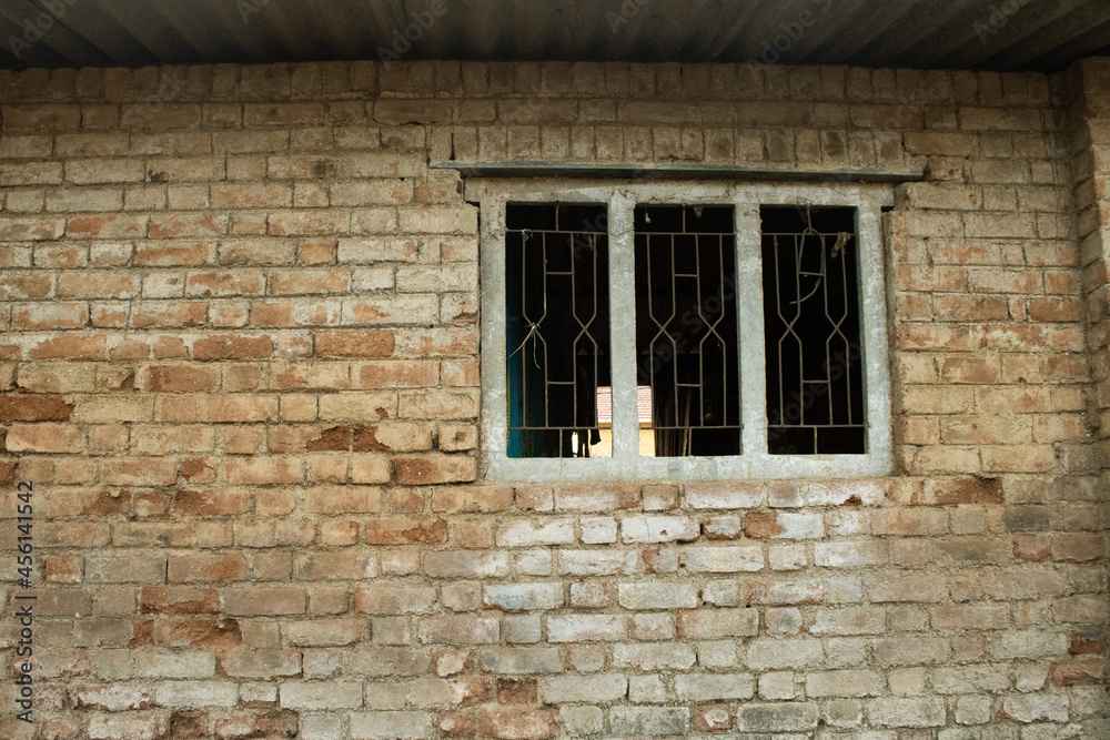 Brick wall with window silhouette 