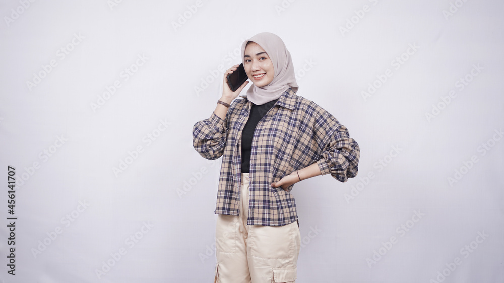 beautiful asian woman contacting via smartphone happily isolated on white background beautiful asian woman contacting via smartphone happily isolated on white background
