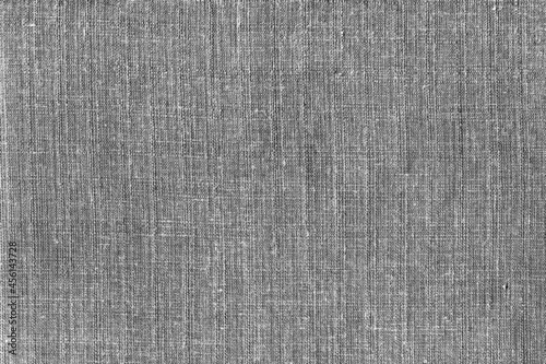 The texture of coarse gray linen fabric. Burlap, rags, coarse natural fabric.