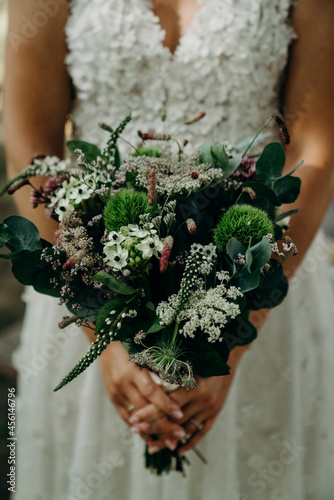 Wedding rings and bouquet