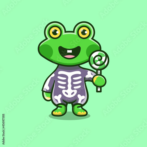 cute frog wearing skeleton halloween costume and carrying lollipop