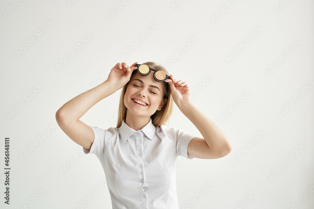 pretty woman in a white shirt with a folder in hand light background pretty woman in a white shirt with a folder in hand light background