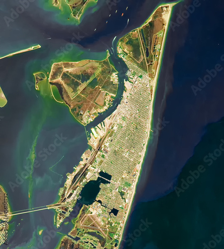 Satellite view of Galveston and Pelican island from the space. Elements of this image furnished by NASA. photo
