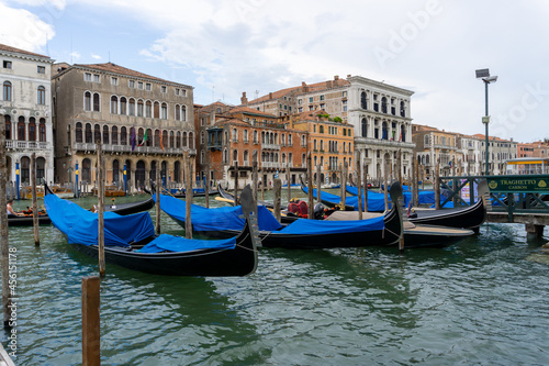 Gondolas parked on the Canal Grande in Venice, with the palaces in the background © Montse