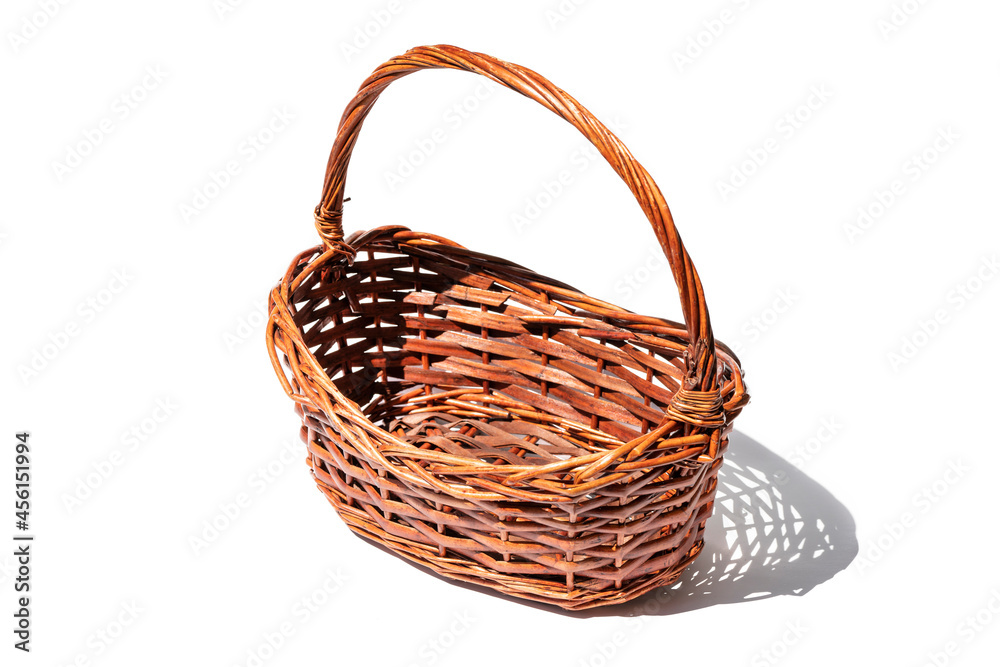 Empty wicker basket. Picnic basket isolated on white background.