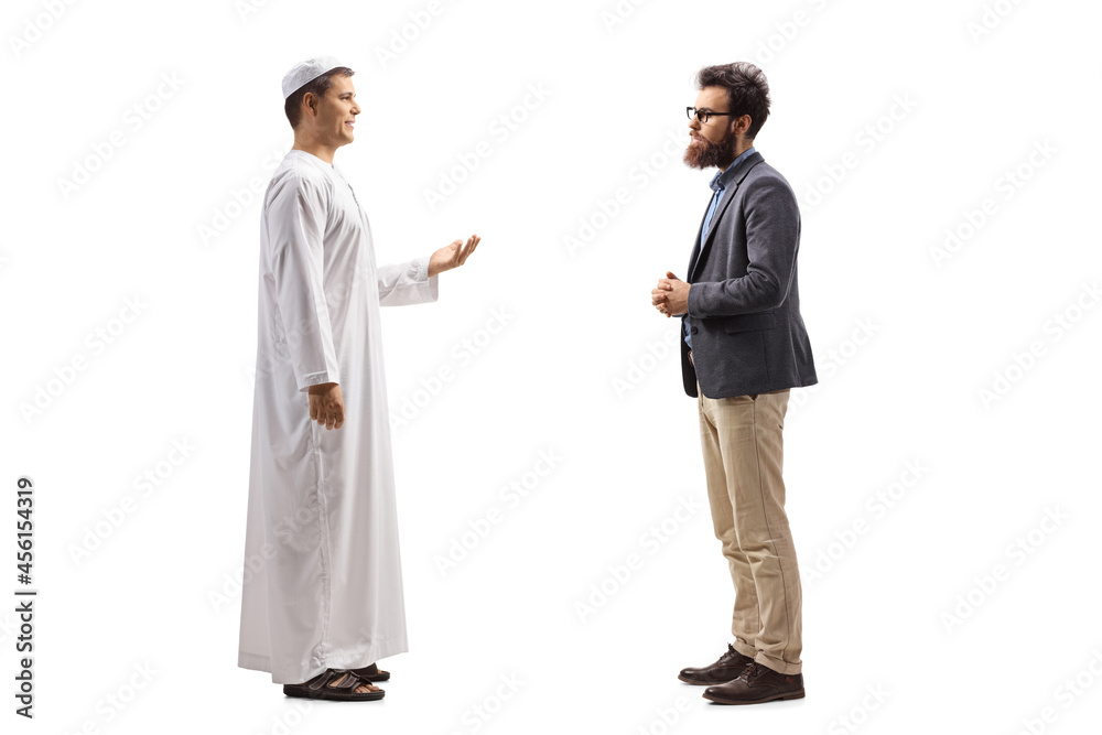 Full length profile shot of a man in ethnic clothes talking to a casual bearded man
