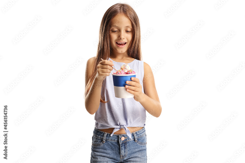 Excited cute girl holding ice cream in a paper cup Excited cute girl holding ice cream in a paper cup