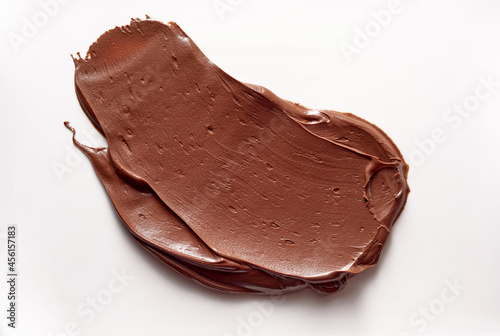Chocolate paste spread on white background