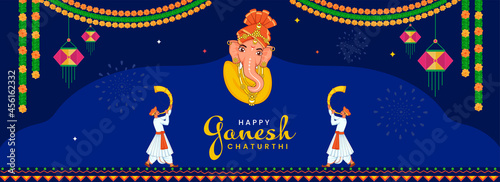 Happy Ganesh Chaturthi Concept With Lord Ganesha Face And Maharashtrian Men Blowing Tutari Horn On Blue Background.