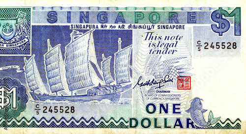 Obverse of 1 one Singapore dollar banknote currency $1 year 1987 issued by Board of Commissioners of Currency features Sha Chuan (traditional Chinese junk) ships, old Singapore money, vintage retro photo