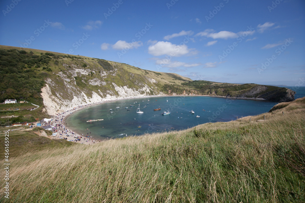 Views of Lulworth Cove in Dorset on a summer day in the UK