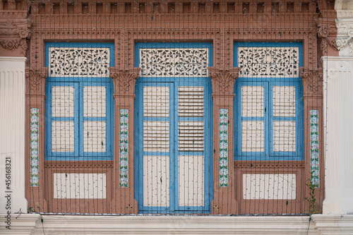 Architectural details of a shophouse windows, Chinatown photo