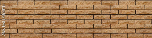Yellow brick wall. Seamless bricks texture. Horisontal background