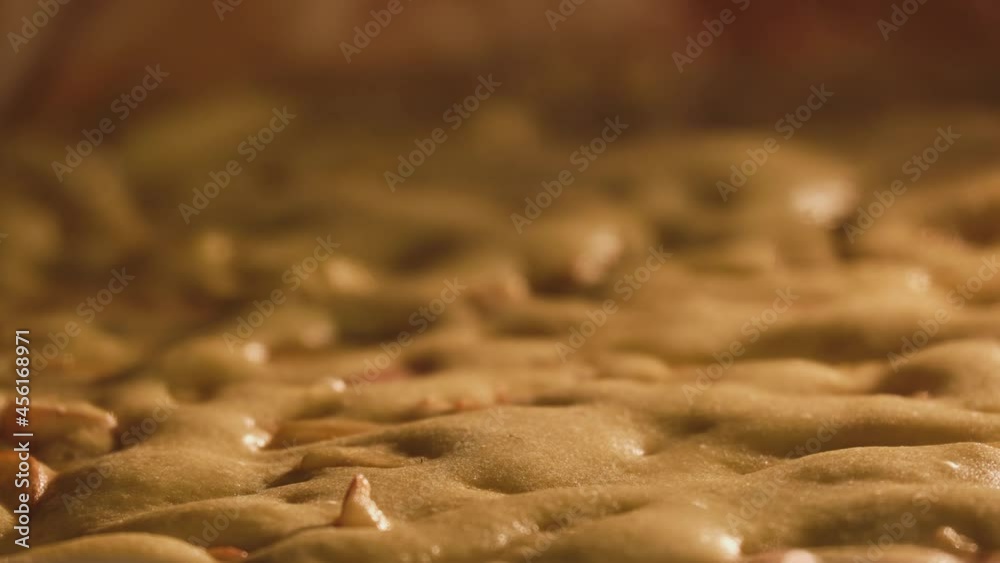 Apple pie is baked in the oven, rising dough with fruit close-up. Apple pie is baked in the oven, rising dough with fruit close-up.