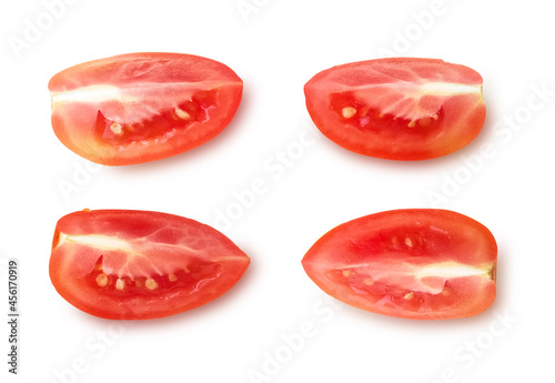 Four slices of tomato isolated on white background