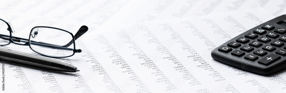 Finance And Business Concept - Pen & Calculator Banner Finance And Business Concept - Pen & Calculator Banner