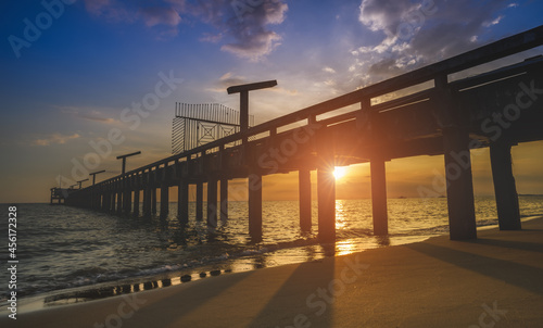 Silhouette long bridge and sky sea scape. © NPD stock