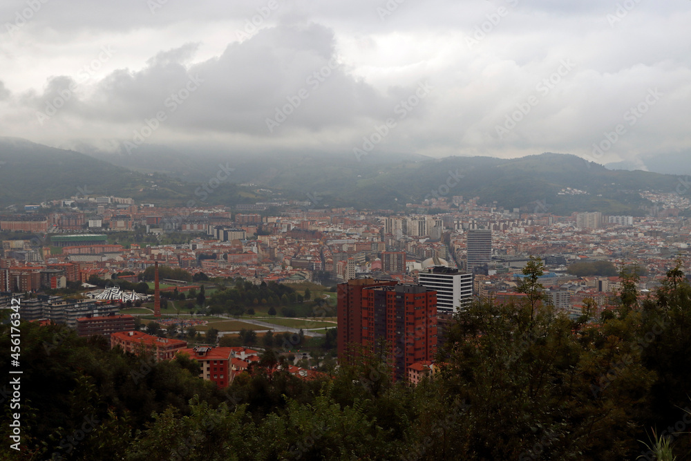 Bilbao seen from a hill in a cloudy day