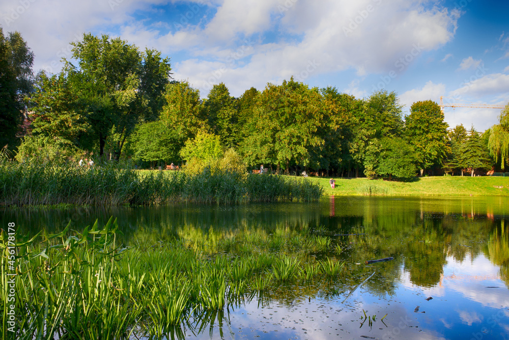 Beautiful lake in the city park in the autumn season Beautiful lake in the city park in the autumn season