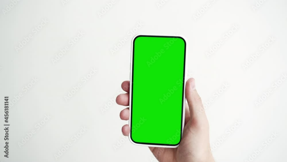 Young Person Touch Screen Smartphone with Green Chroma Key Close-up. Guy Tapping Gesture on Cell Phone Mock-up POV. Concept Watch and Show Internet Social Media, Calls, Read News, App, iot, e-Shopping Young Person Touch Screen Smartphone with Green Chroma Key Close-up. Guy Tapping Gesture on Cell Phone Mock-up POV. Concept Watch and Show Internet Social Media, Calls, Read News, App, iot, e-Shopping