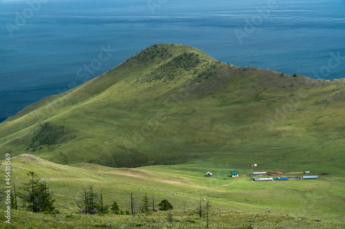 Farmers' farmsteads in the Tazheranskaya Valley on the shores of Lake Baikal photo