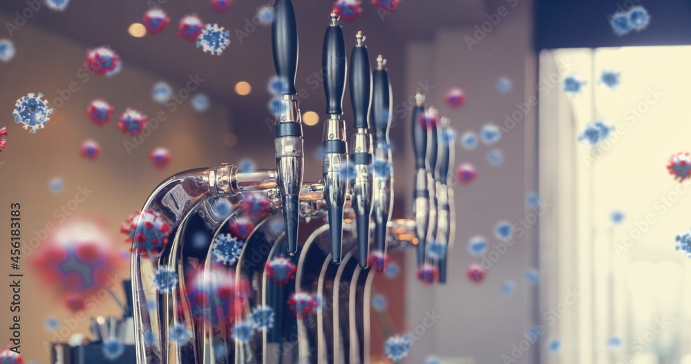 Image of macro Covid-19 cells floating on beer taps in a bar in a background