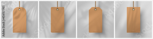 Realistic tags mockup: four blank brown tags with overlay tropical shadow. Vector illustration Ai10, EPS10