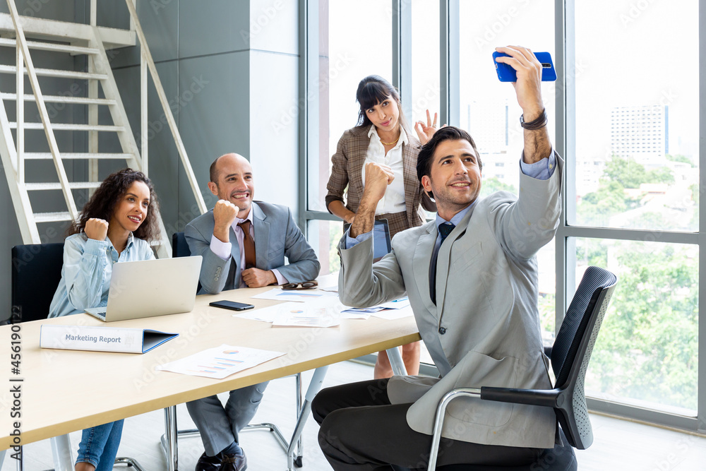 Businesspeople discussing together in the conference room during meeting at the office. Businesspeople discussing together in the conference room during meeting at the office.