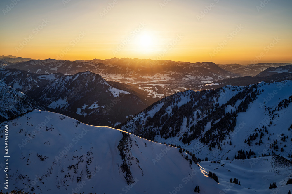 Colorful sunset in the mountains at a cold winter day. Allgau Alps, Bavaria, Germany