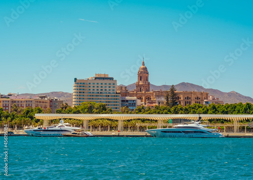 Sea view and seafront promenade port of Malaga in summer