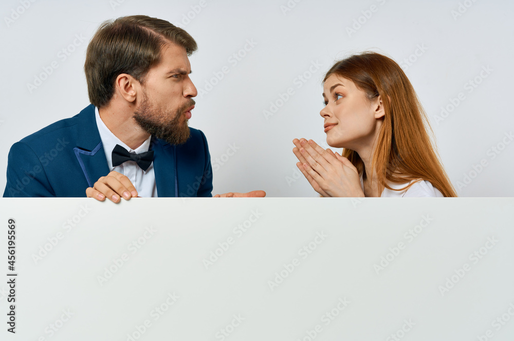 Man and woman billboard marketing fun emotions White background Man and woman billboard marketing fun emotions White background