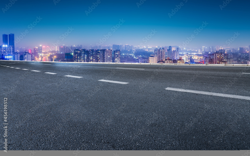 Road and city buildings background Road and city buildings background