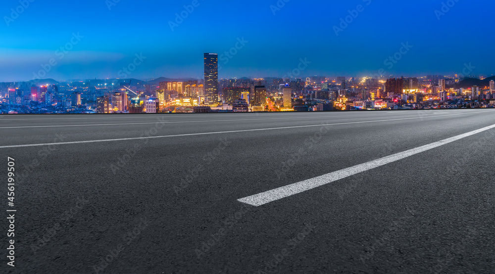 Road and city buildings background