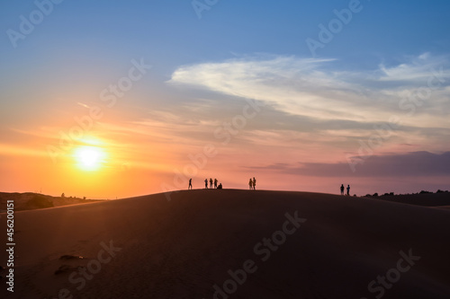 Beautiful of sunset at sand desert at Vietnam, for traveler to sightseeing, white sand dune as landmark of Vietnam